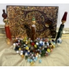 Image 1 : Wooden Figurines, Painting, and Assorted Marbles
