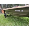 Image 3 :  Sundolphin, 12 foot hard plastic boat with trailer seats, lifejackets motor and gas can.
Johnson se