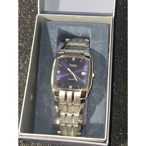 "Caravelle" Bulova Watch w/ Stainless Steel Bracelet and Diamond 