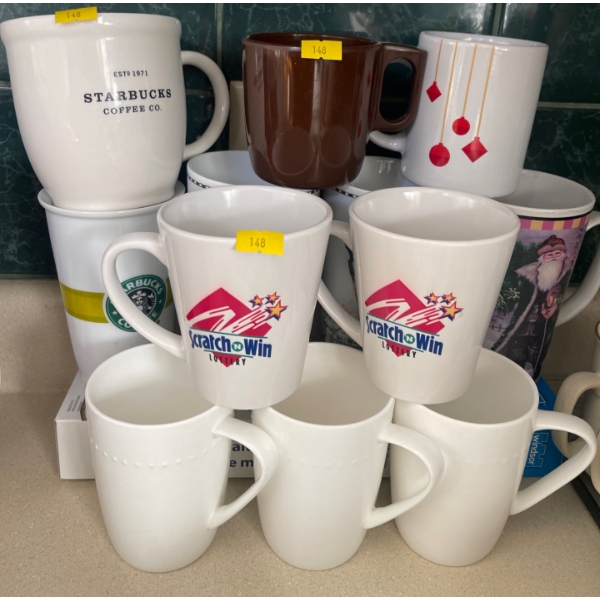 A Bundle of Coffee mugs  and Collectible Disney Mugs