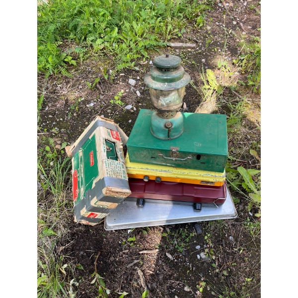 Selection of Coleman camp stoves a lantern and two other camp stoves all sold the other one lot