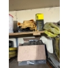 Image 4 : Top two shelves with several miscellaneous items, tools, hardhats boxes of rivets boxes of rope, air