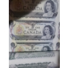 Image 4 : Uncut Canadian One and Two Dollar Bills