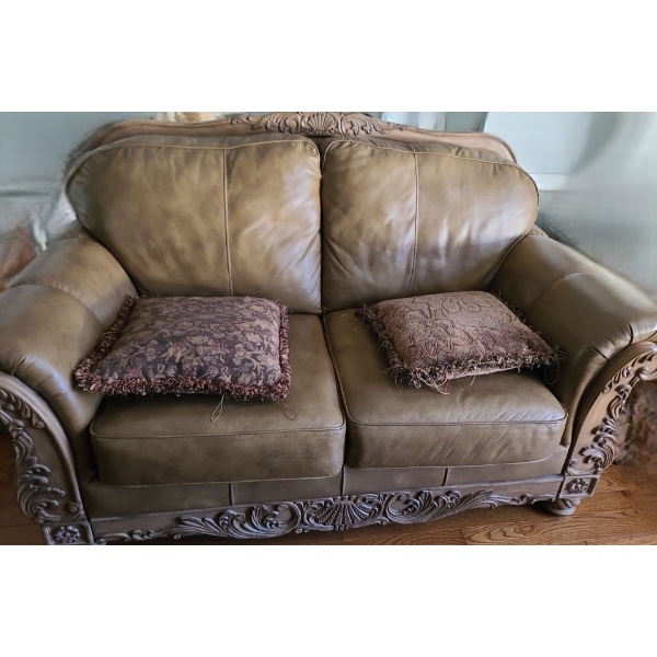 Leather Loveseat w/ Carved Shell Motif 71 W, 40 D, 41 T 