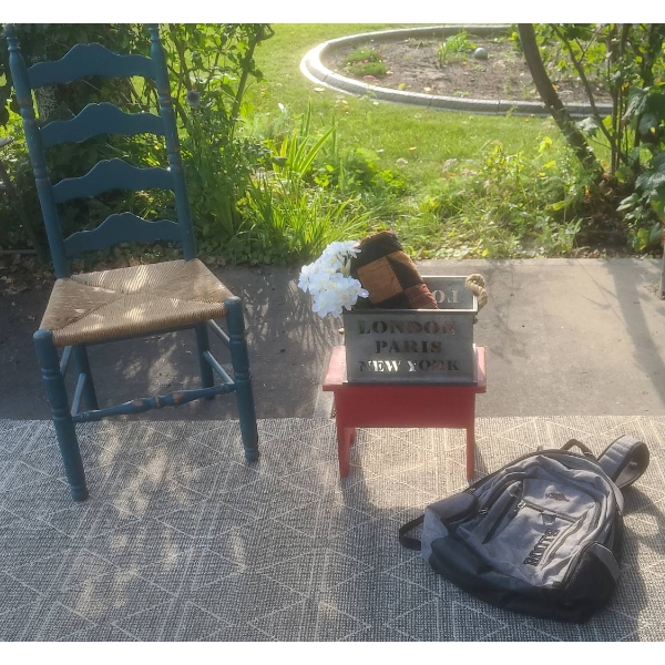 Household Items with Antique Hummingbird Feeder and Roots Backpack