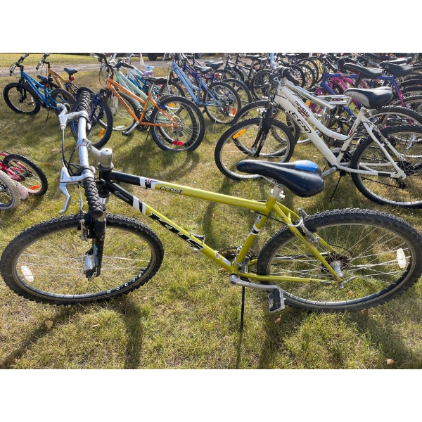 KHS crest, lime green mountain bike with aluminum front and back rims front suspension and front and