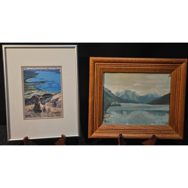 Two Framed Artworks: Mountain Landscape Painting and Wildlife Print