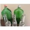 Image 2 :  vintage Lucky One beverage bottles, likely from the 1970s