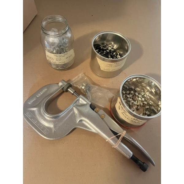 Hoover Press-N-Snap Tool, which is a professional-grade handheld tool used for quickly installing fa