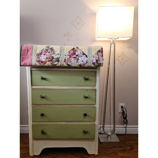 Green and Cream Painted Dresser with Bird Pulls, Floor Lamp, and Patchwork Quilt
