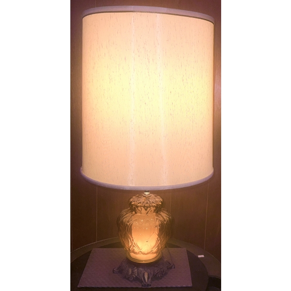Table Lamp With Amber Glass Base, Ornate Metal Foot, and Cream Fabric Shade