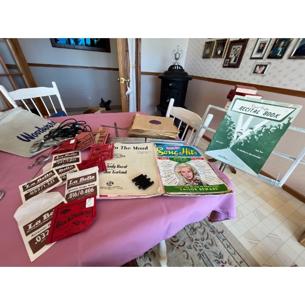 Vintage Music stands and recital books . With a selection of antique black diamond Labella guitar st