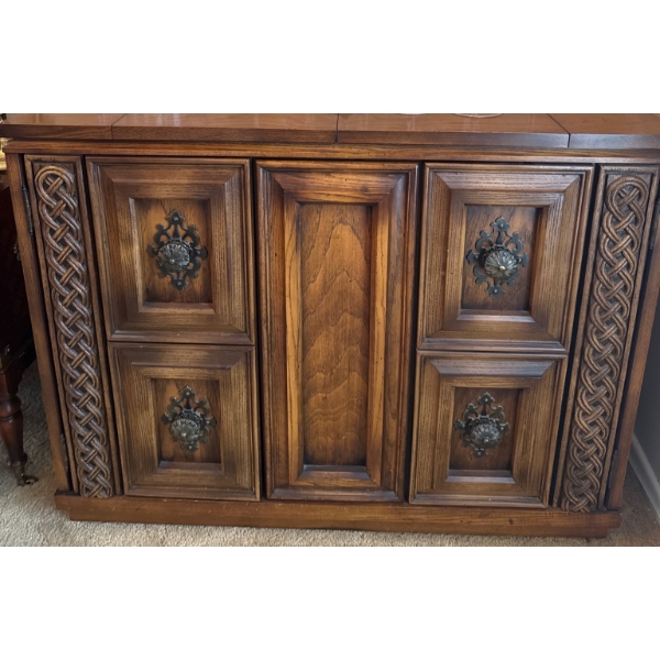 Ornate Wooden Cabinet with Metal Accents and Storage Shelves