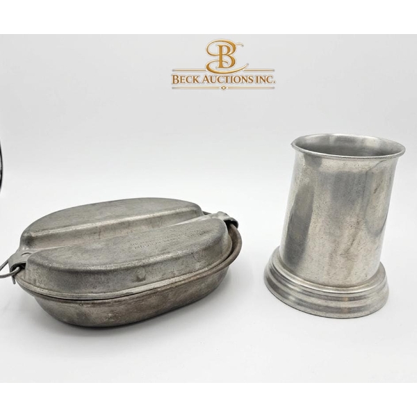 Classic Drinking Cup, Aluminum Pot And Pan Used By Military Personnel For Cooking And Eating.