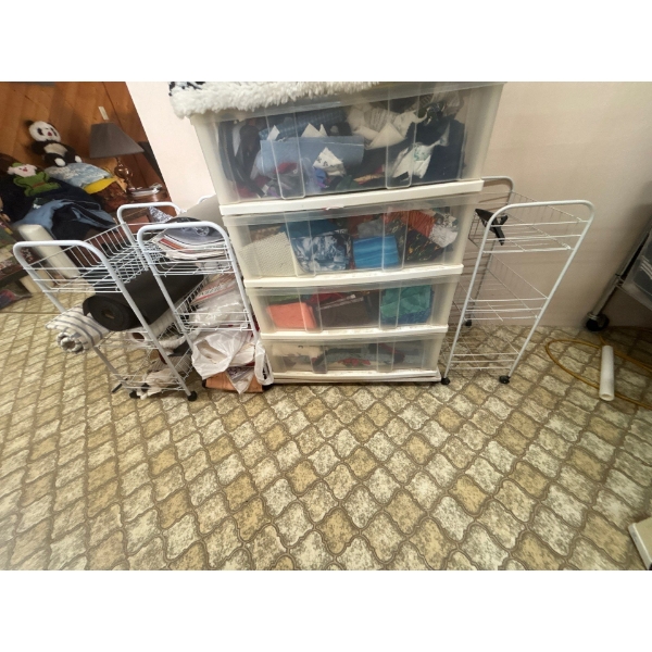 Bins full of fabric and replacement zippers bin included with three wire racks 