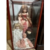 Image 1 : Collection of Vintage Dolls In A Glass Wooden Case
