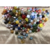 Image 2 : Wooden Figurines, Painting, and Assorted Marbles