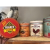 Image 2 : collection of tins with a Quaker oat vintage tin