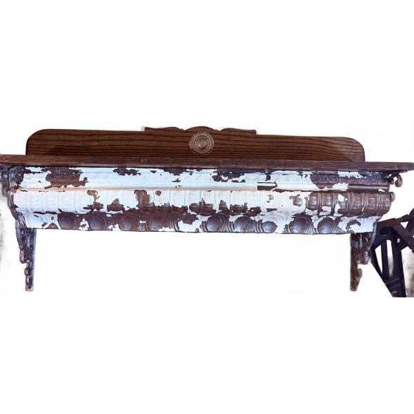 Wall-Mounted Shelf with Ornate Cast Iron Brackets and Wood Back Panel