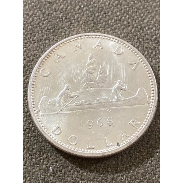 1966 Canadian Silver Dollar Coin with Canoe Design