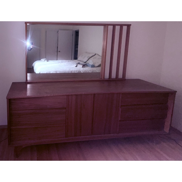 Wooden Dresser with Integrated Mirror and Sliding Doors