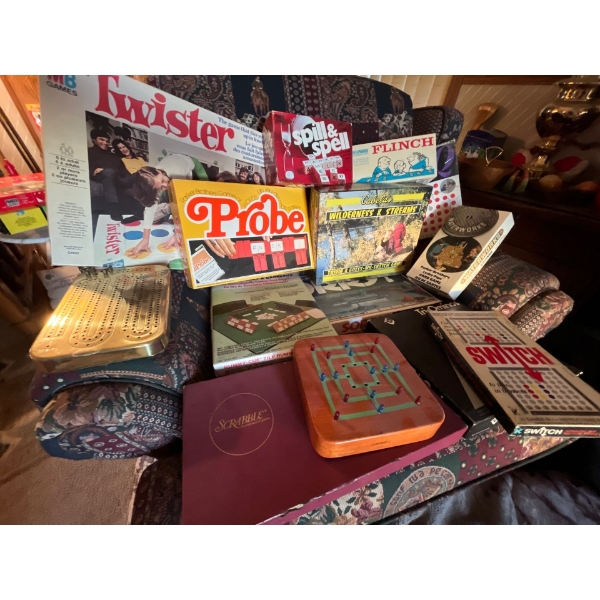large collection of vintage games, twister spill and spell probe, flinch, scrabble sorry . Tri- omin