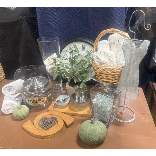 Home Decor Items Featuring Clock, Vases, and Accessories