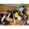 Image 3 : shelf with contents, including saws, cutoff, saws, electric drills, painting supplies, and a number 