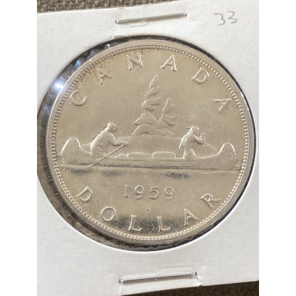 1959 Canadian Silver Dollar with Canoe Design