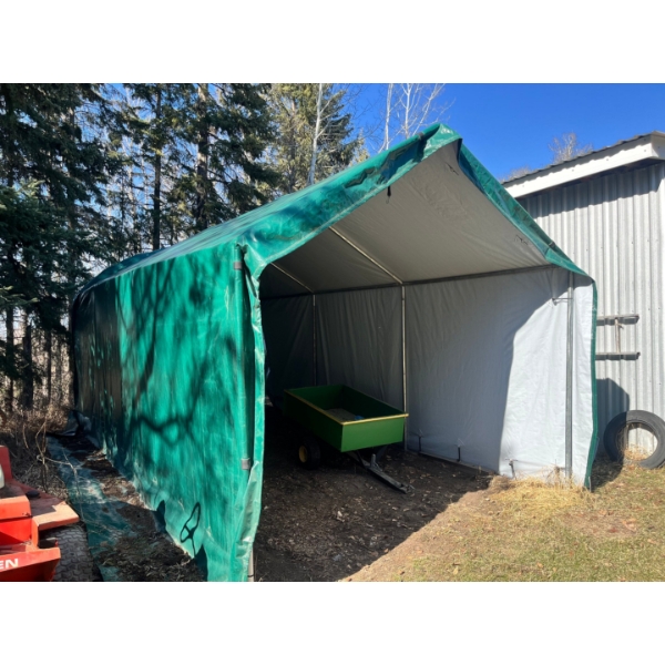 portable shelter, likely a temporary garage or storage building. Bidders to disassemble and haul awa