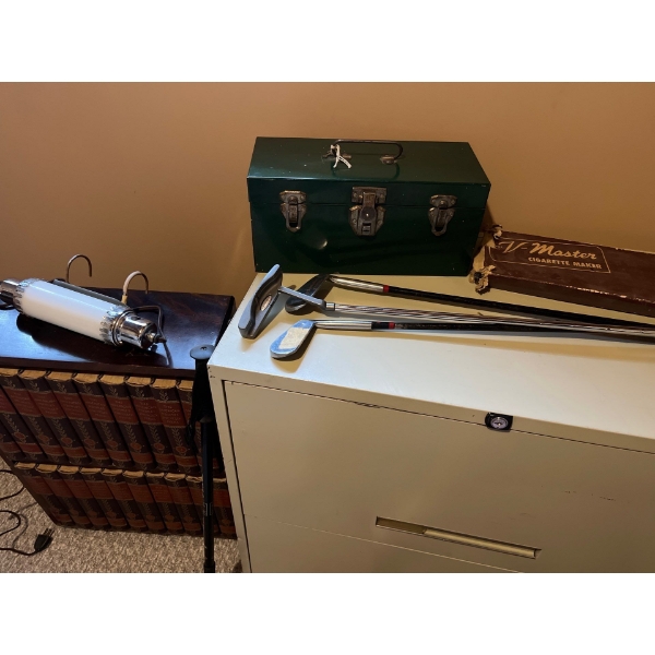 Vintage light toolbox, antique cigarette roller/maker and some vintage golf clubs with a full set of