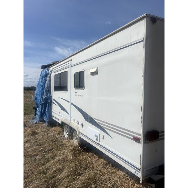 Travel Trailer needs some work great set up to make into a Ice Fishing Shack .