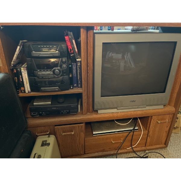 Sayo TV with Panasonic stereo with & Sanyo BHS along with shelf and number of DVDs, everything inclu