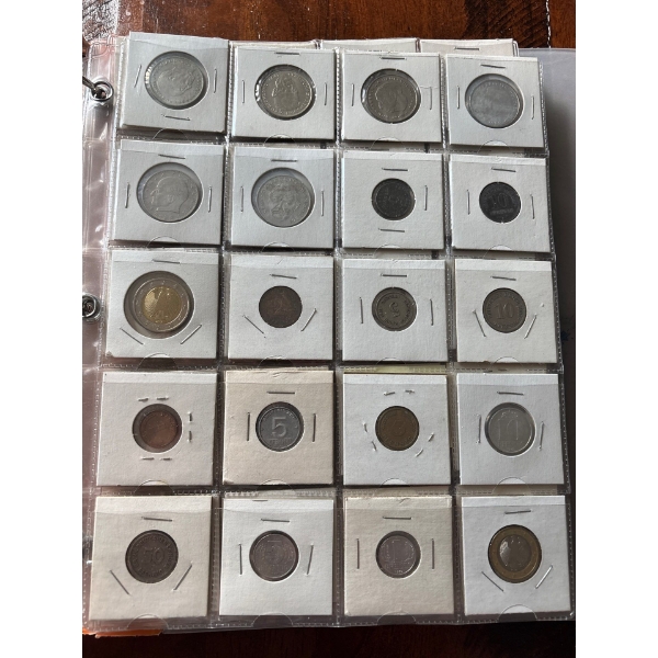 Large collection Of World Coins In Binder with Protective sleeves Some are silver 