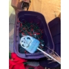 Image 3 :  huge Rubbermaid filled with red Christmas lights of poinsettias, two Christmas wreaths, some green 