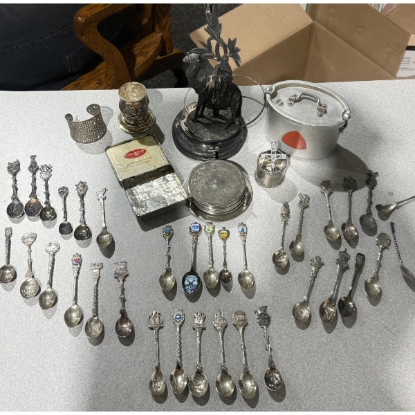 Decorative Metal Collectibles Including Camel Figurine and Souvenir Spoons