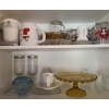 Image 1 : Contents of Cupboards: Yellow Cake Plate, Drinkware, Bowls, Wall Clock, Vases, Artificial Flowers