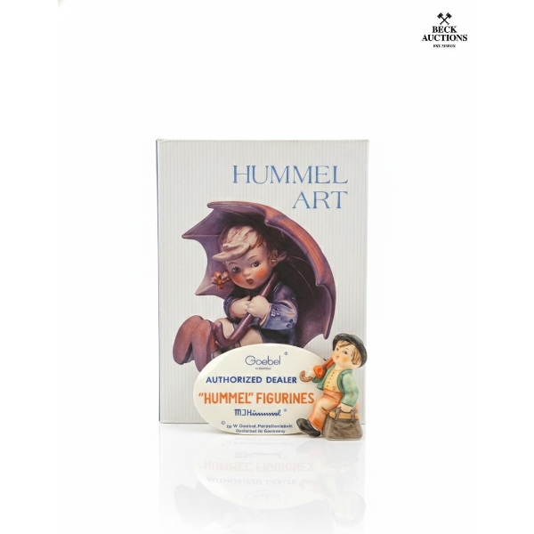 Vintage Hummel Art Book By John F. Hotchkiss Alongside A Goebel Porcelain Figurine. 