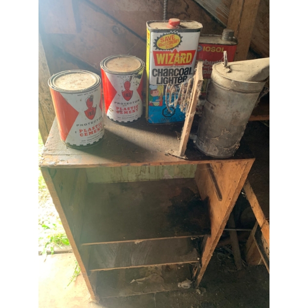 Garage shelf with Tins and Bee Smoker
