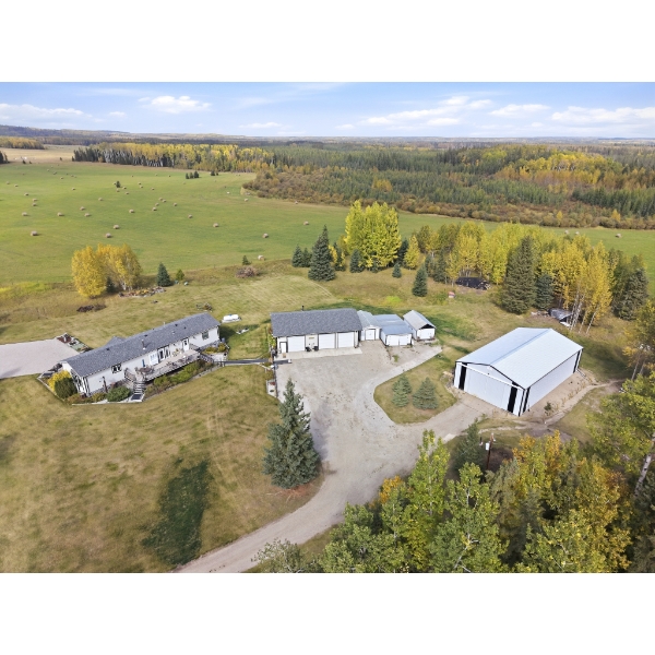 6.4 ACRE PROPERTY — NOW IN AUCTION Located in Clearwater County, Alberta. Enjoy acreage liv