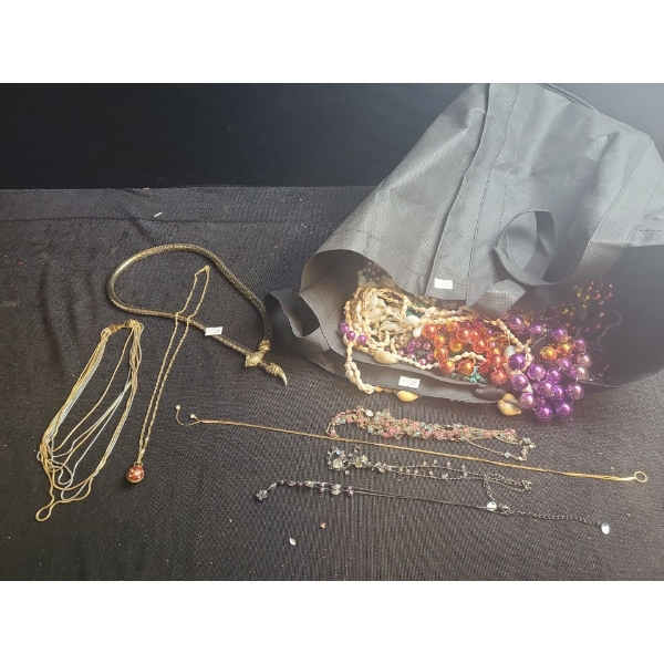 Assorted Costume Jewelry Including a Snake Head Necklace 