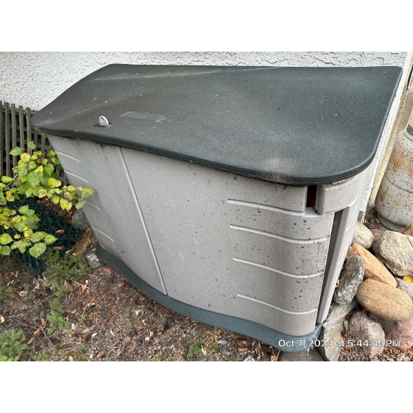 Large Plastic Garden Storage Full Of Jerry Cans