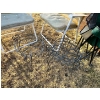 Image 2 : Five lawn chairs with three plant stands. 

