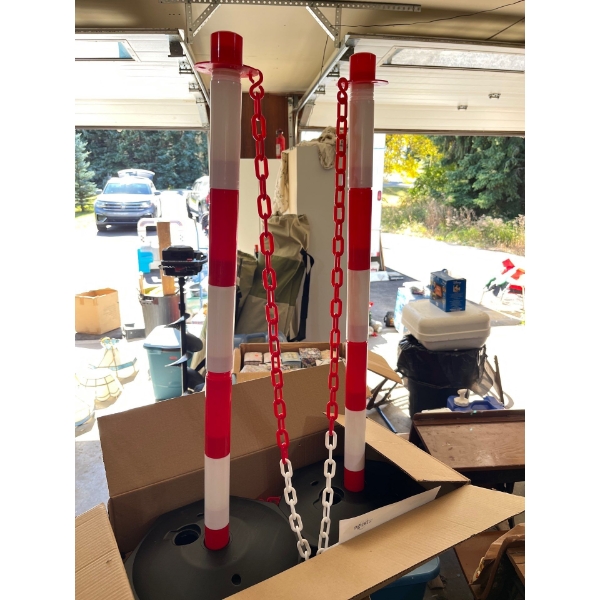 large selection of plastic stanchions with bases and chains 8 boxes all new. . Great for car displa