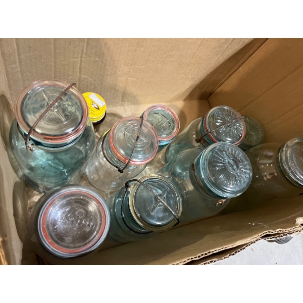 9 blue mason jars all with tops in great condition with a small jar of antique marbles