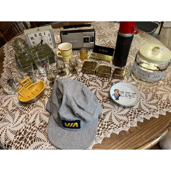  Vintage via rail hat, cookie jar radio clock, vintage tins, cookie jar, thermos, and small vintage 