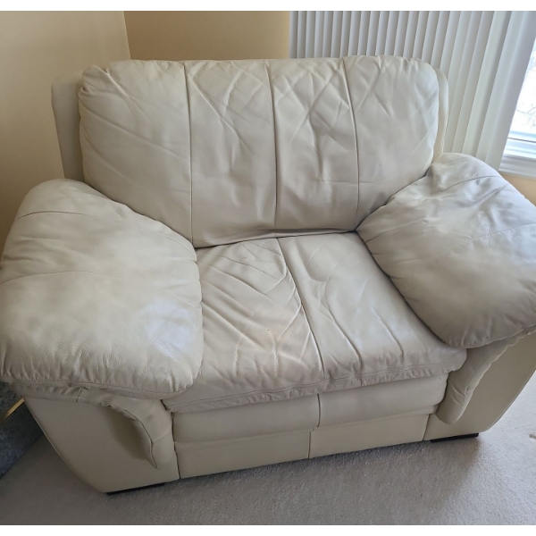 Ivory Leather Chair 49 w, 32 h, 34 d