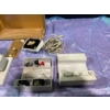 Image 2 : Vintage Elna Sewing Machine with Case, Foot Pedal and Spare Parts - Works