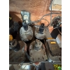 Image 4 : deWalt cordless drill with several DeWalt batteries and chargers

