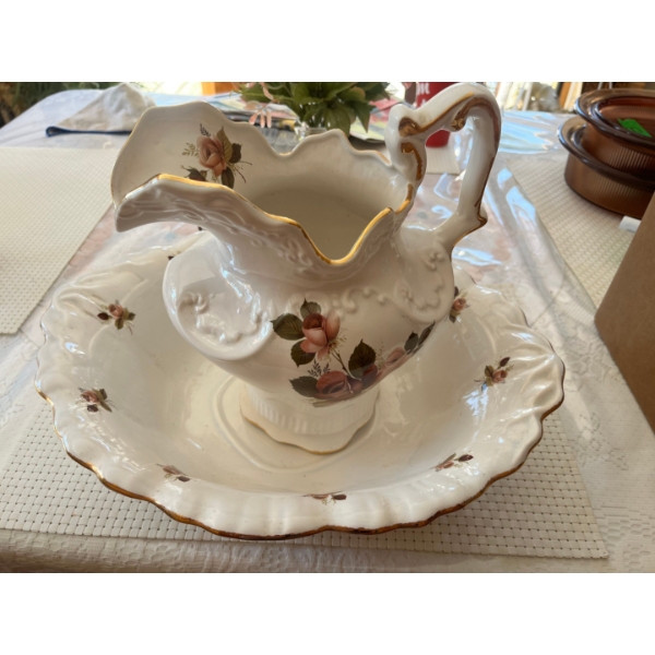 Collectible vintage porcelain wash pitcher and basin set featuring a pink rose floral pattern with g